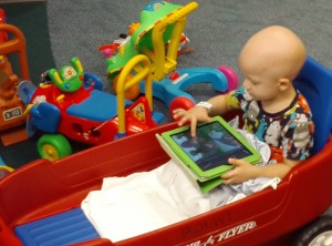 Jake's playing on one of the Gladpads that Trinity's 7th garders and Gladiators donated to TCH's Onc Child Life Specialists (these help keep the kids calm and occupied).